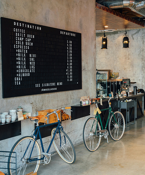 two bicycles parked next to a cafe counter