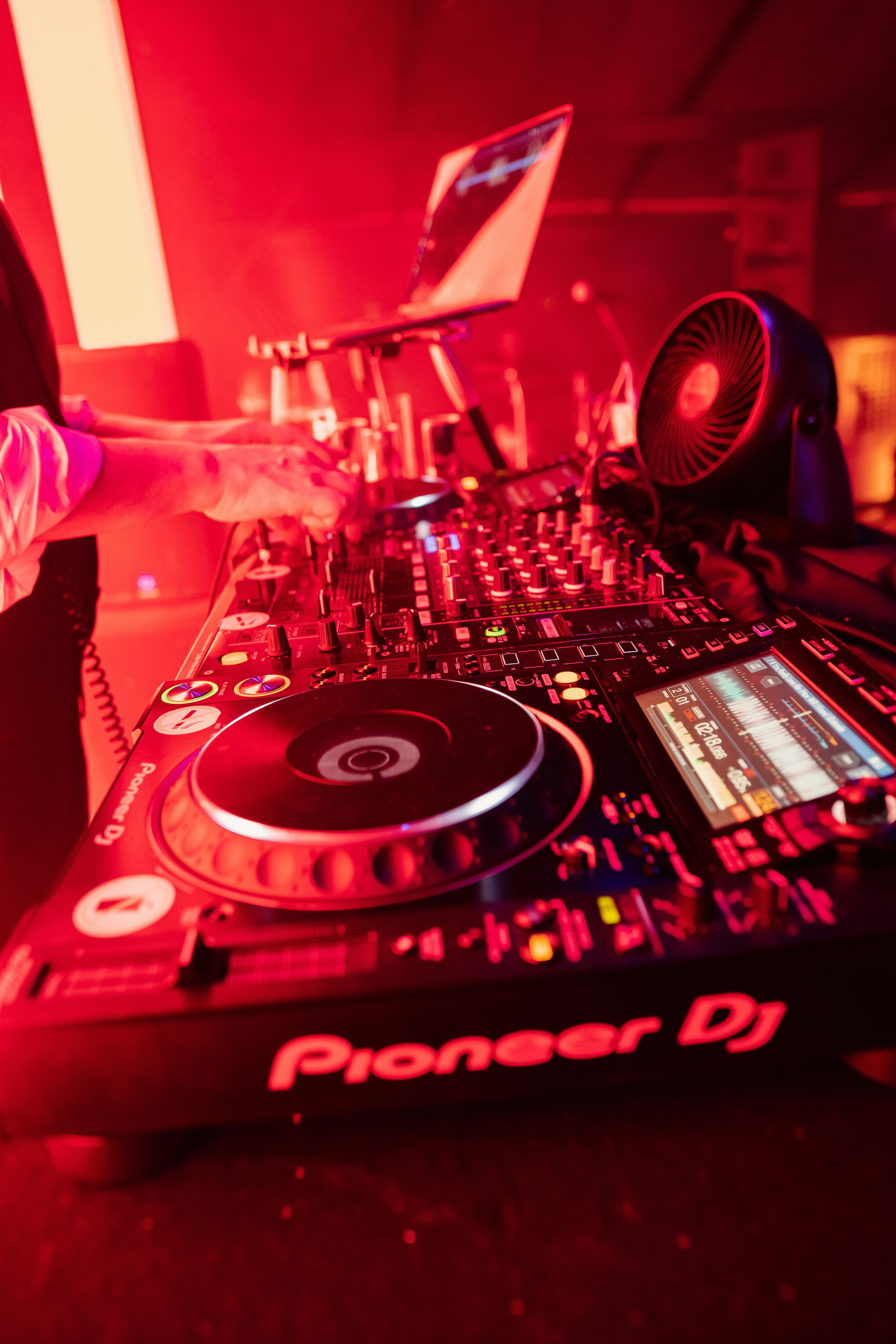 DJ turntable with red lighting