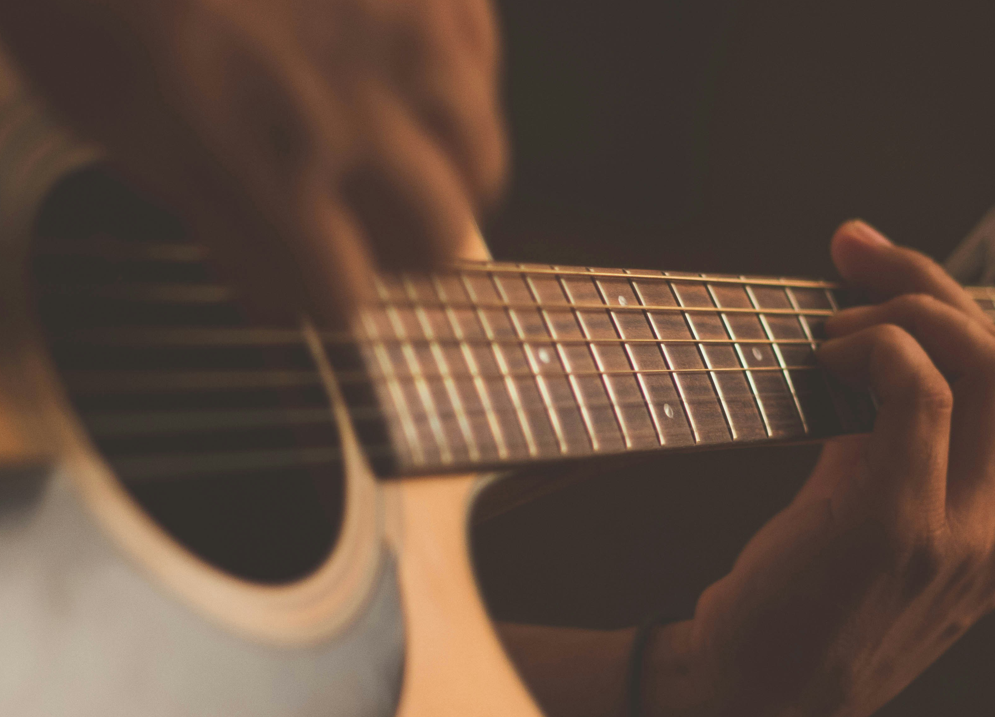 Person playing guitar