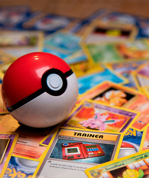 a pokeball and trading cards